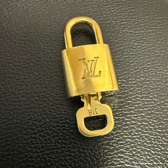Louis Vuitton Gold Padlock with Key Authentic - Picture 2 of 6